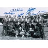 DERBY COUNTY A b/w 12 x 8 photo of players posing with their trophies and medals which they won in