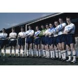 TOTTENHAM A col 12 x 8 photo of players lining up shoulder to shoulder during in the goalmouth at