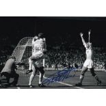 GEOFF HURST A b/w 12 x 8 photo of the players celebrating with Hurst after his winner against
