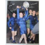 MANCHESTER UNITED A col 16 x 12 photo of Nobby Stiles, Tony Dunne, Pat Crerand and Alex Stepney