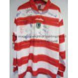 WALES SIGNED SHIRT A Wales Lotto replica shirt from the 2000's signed by 17 players including Speed,