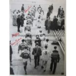 MANCHESTER UNITED A b/w 16 x 12 photo of the players walking out onto the field of play prior to the