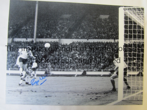 ROGER HUNT A b/w 16 x 12 photo of Hunt scoring one of his two goals in England’s victory over France
