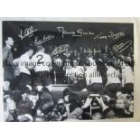 TOTTENHAM A b/w 16" x 12" photo of Danny Blanchflower accepting the First Division trophy as he is