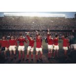 MANCHESTER UNITED A col 12 x 8 photo of the players lining up shoulder to shoulder prior to the