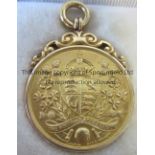 1938 F.A. CUP RUNNERS UP MEDAL A boxed runners-up 9carat gold hallmarked medal issued to a