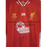 LIVERPOOL GERRARD A replica Liverpool shirt with the Steve Gerrard Foundation replacing the