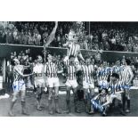 RANGERS B/w 12 x 8 photo of the 1964 Scottish Cup winners celebrating with their trophy at Hampden