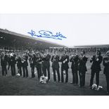 JACK CHARLTON B/w 8 x 6 photo showing Leeds United players applauding supporters at Elland Road