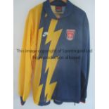 ARSENAL PROTOTYPE SHIRT A blue and yellow Nike prototype away shirt proposed for season 1995/6 which