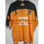 QUEEN'S PARK RANGERS An orange short sleeve Influence shirt with black at the top, shirt sponsor