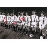 MANCHESTER UNITED B/w 12 x 8 photo of players lining up shoulder to shoulder prior to a ECWC tie