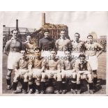 MANCHESTER UNITED A 10" X 8" B/W team group photo, taken on the pitch in 1946. Generally good