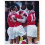 ARSENAL Forty colour action press photos from the 1990's, most are 10" X 8" with either stamps or