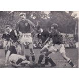 JIMMY SCOULAR Two original 12" X 9" Press photos from the early 1950's, with his father holding