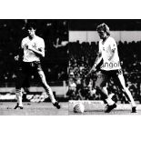 TOTTENHAM HOTSPUR Thirty 8" X 6" B/W press photos with stamps and a majority with paper notations on