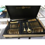 A cased Solingen gold tone cutlery set.