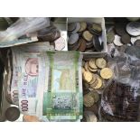 A tin containing old bank notes and coins various