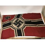 A German WW2 style flag, marked Reichskriegflg 1941 Hamburg. Size approx 130cm by 80cm.