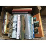 A box of books on antique firearms and military topics