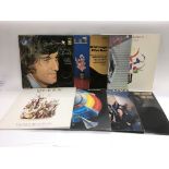 Nine records including a limited edition etched 12inch disc of Queen's 'The show must go on'.