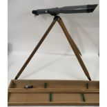 An Alpina boxed telescope and stand
