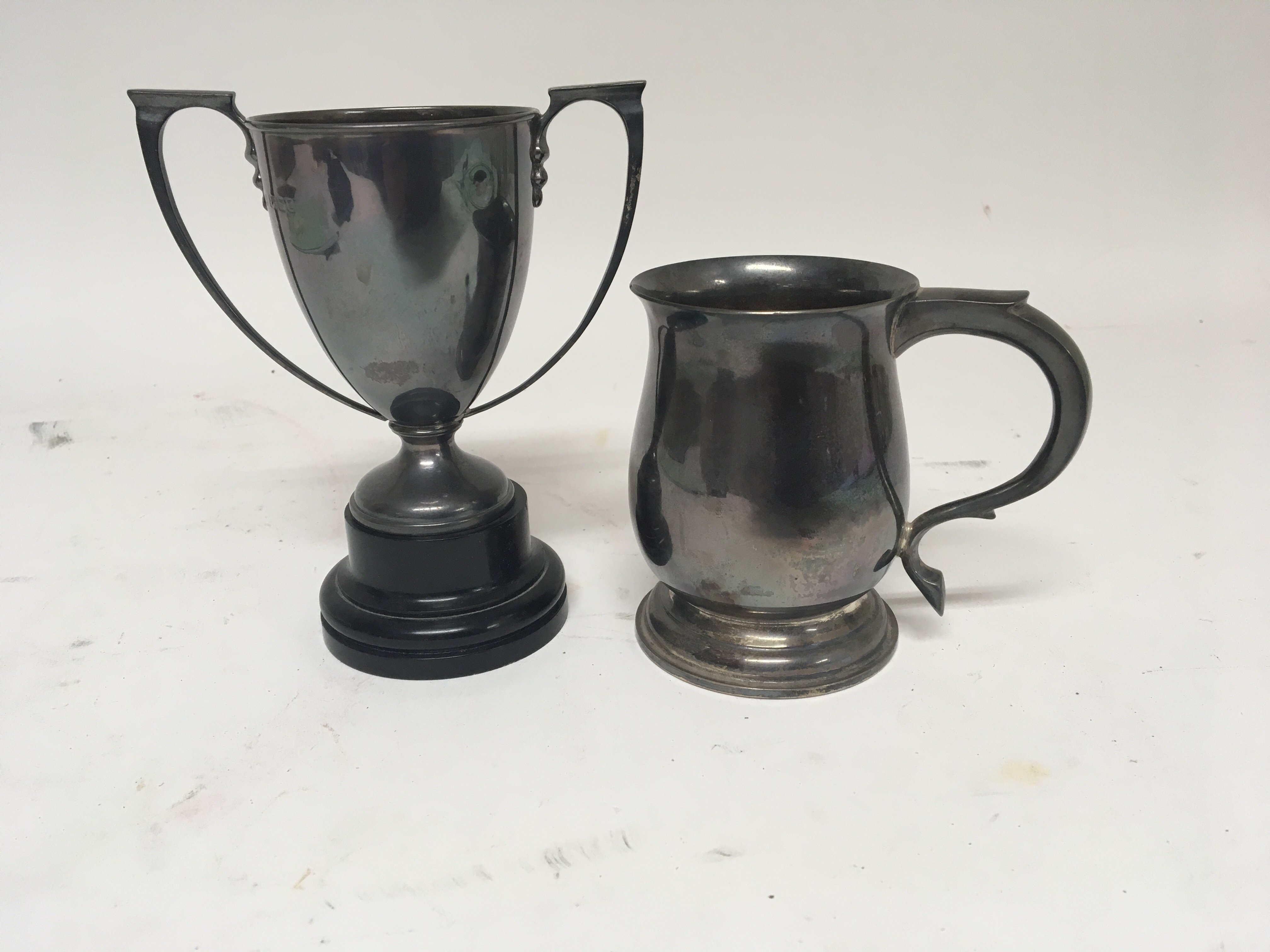 A small silver Mug Birmingham hallmarks and a silv