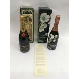 Two limited editions bottles of champagne presente