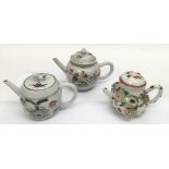 Three small Chinese teapots comprising one of barr