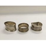 Three silver napkin rings, different hallmarks.