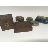 A collection of small boxes including Indian inlaid boxes.