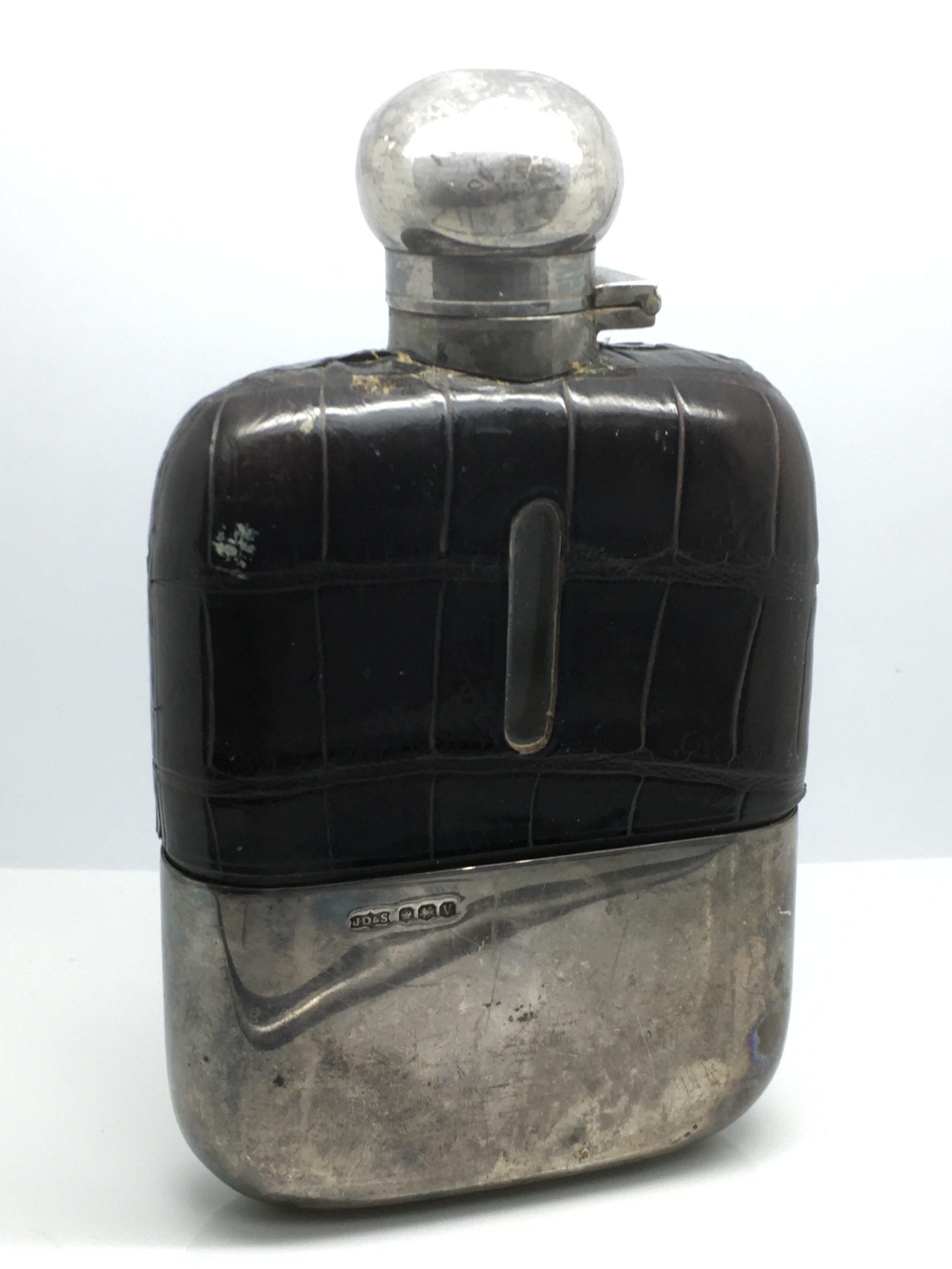 A silver and leather cased spirit flask, Sheffield