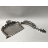 A silver plated French crumb brush and crumb pan,