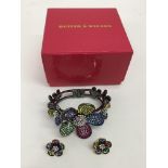 A boxed Butler&Wilson coloured crystal flower brac