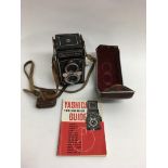 A Yashica Mat camera and guide