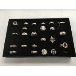 A collection of 24 silver rings, various styles an