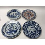 Group of four plates to include three Chinese blue