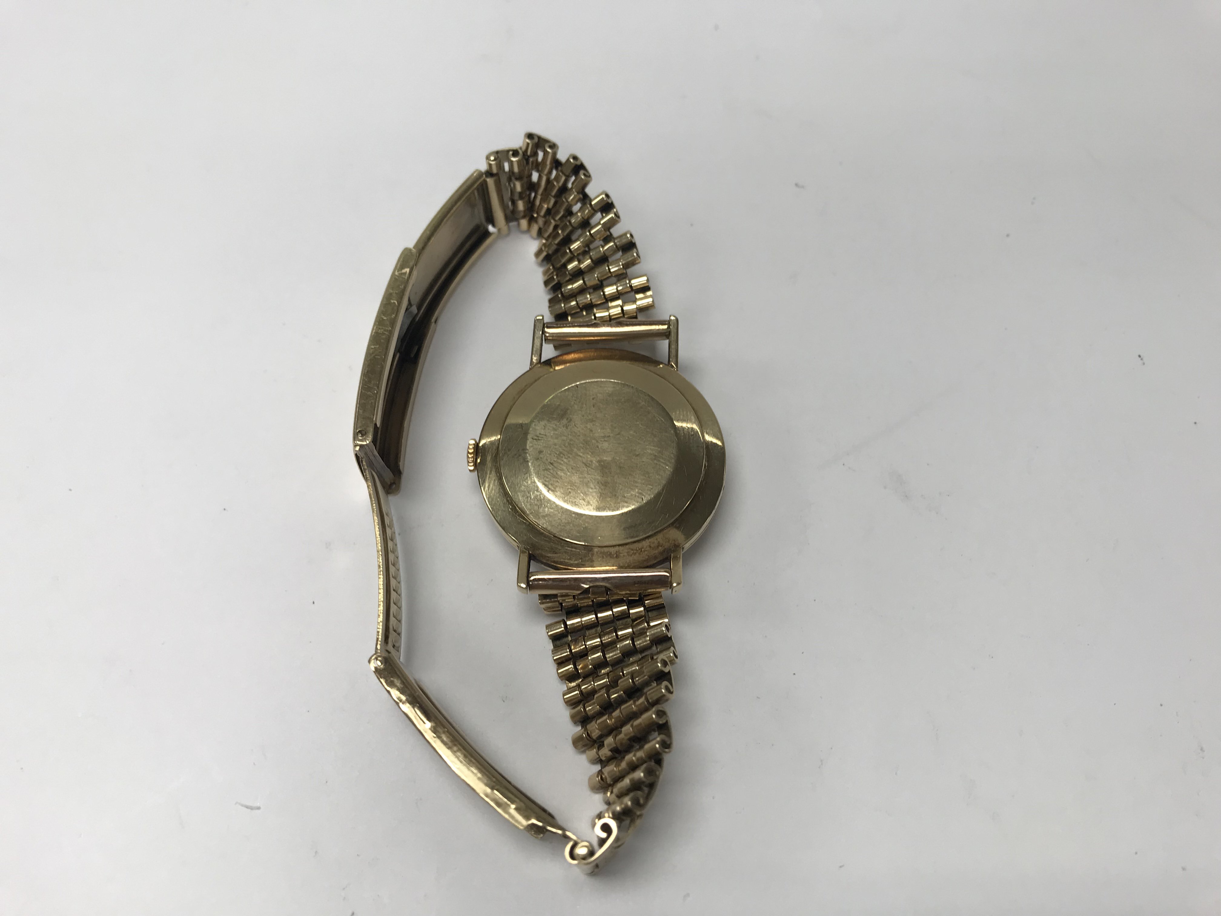 An 9ct gold cased Ebel wristwatch with a 24 Jewel movement, mounted on ...