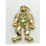 An 18ct gold brooch in the form of a 'ninja turtle
