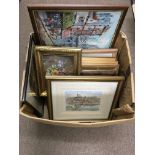 A box of various pictures and prints