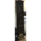 A long case clock in need of restoration, with weights and mechanism. Height approx 205cm.