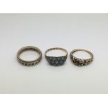 Three 9ct gold rings set with different stones, ap