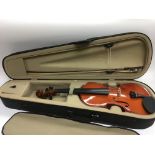 A cased Valentino violin and bow.