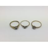 Three diamond solitaire rings, approx total weight