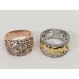 Two contemporary coloured silver rings one having