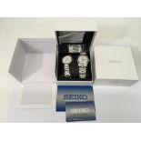 A boxed Seiko gent's watch plus one by Carriage