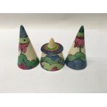 A Clarice cliff cruet set decorated in the Rudyard