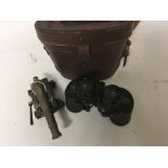 A pair of American binoculars and a small model ca