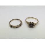 Two gold rings set with stones, hallmarks indistin
