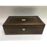 A mahogany writing slope with fitted interior and